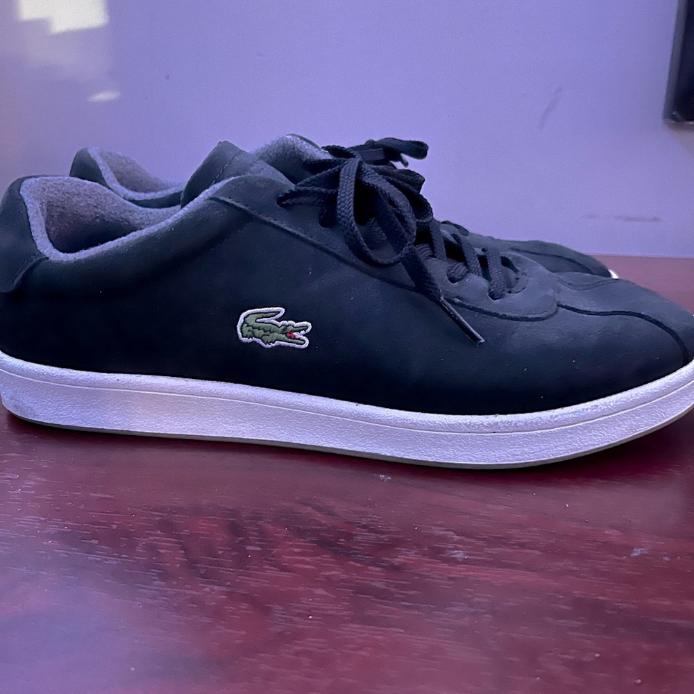 Gently worn suede Lacoste men’s casual shoe